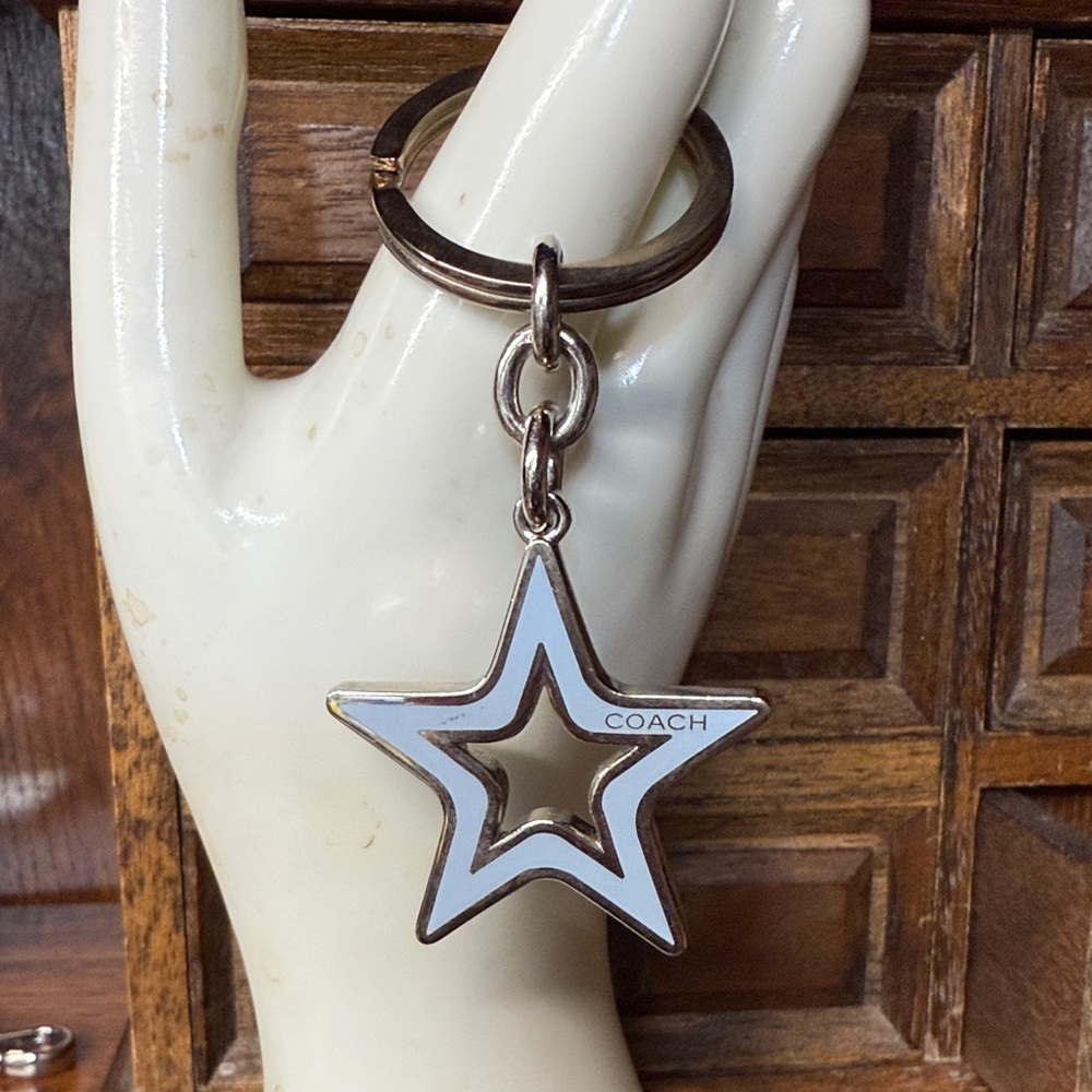 NWOT Rare Vintage Coach Silver and Blue Star Keychain.